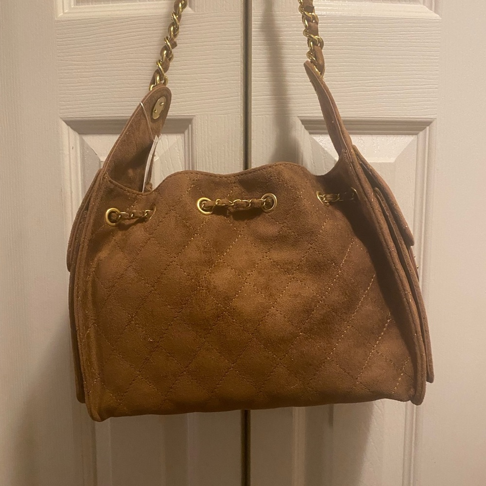 Elegant Black Suede Quilted Shoulder Bag
Brown and tan are sold